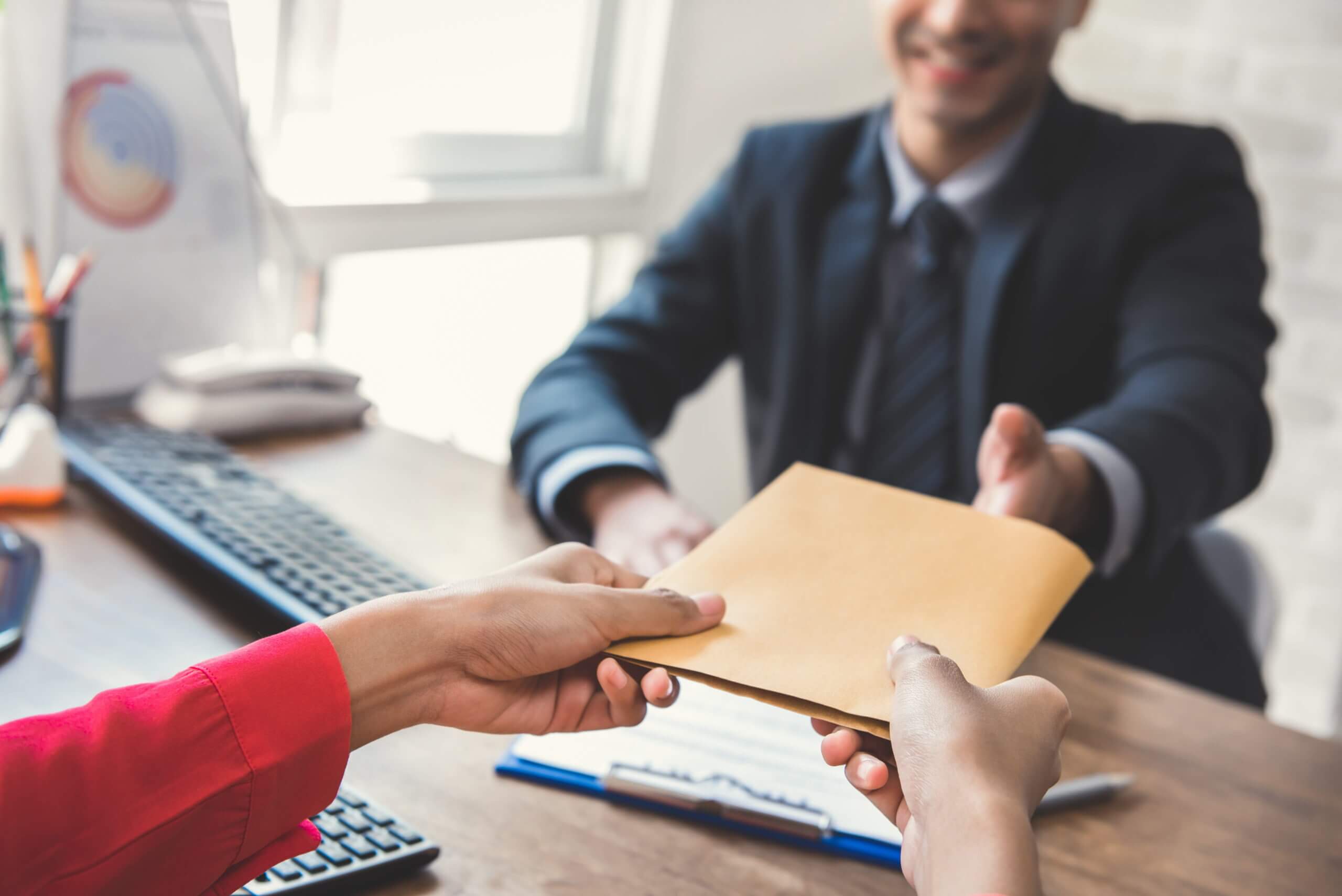 handing over payment and paperwork