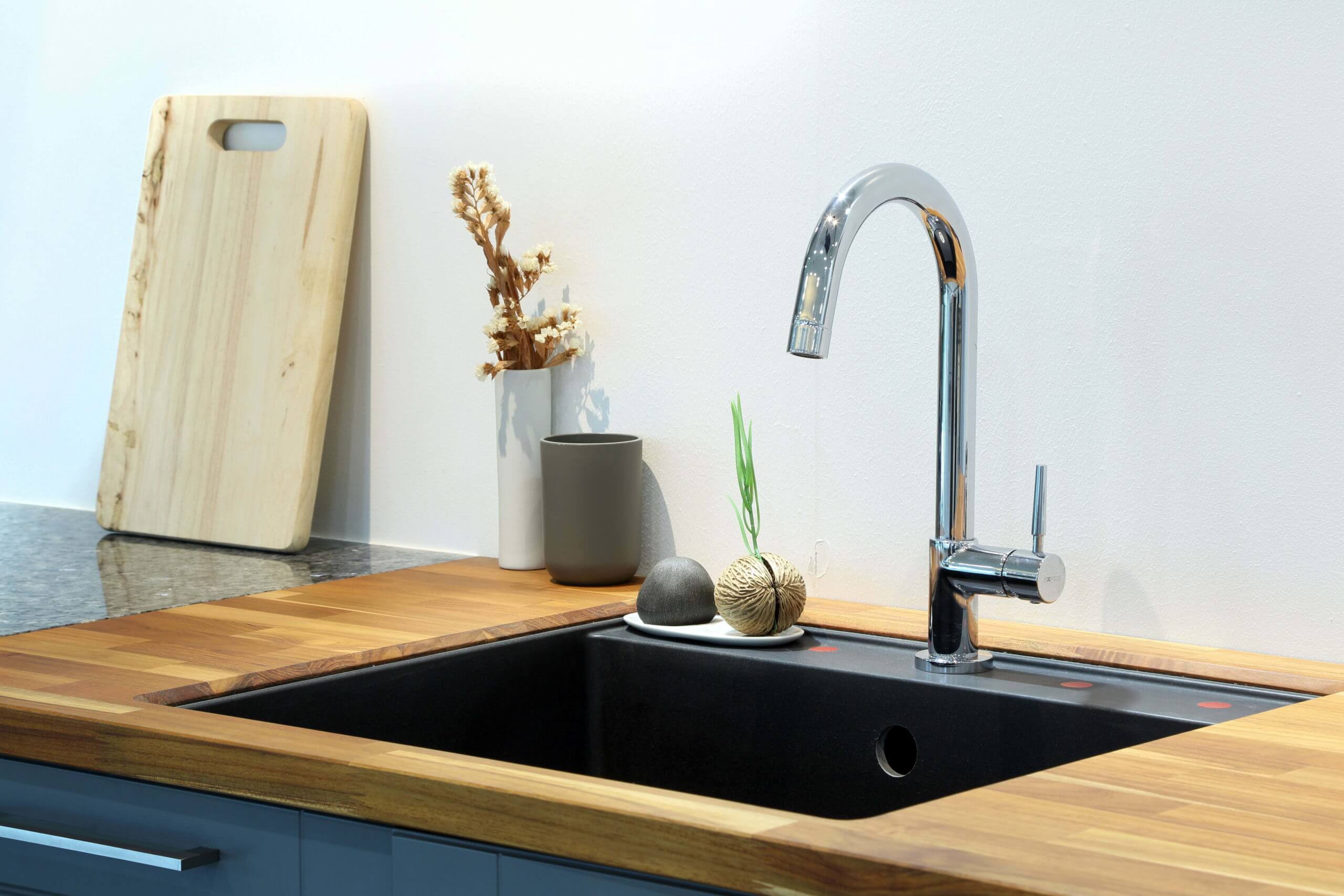 upgraded modern sink in nice kitchen