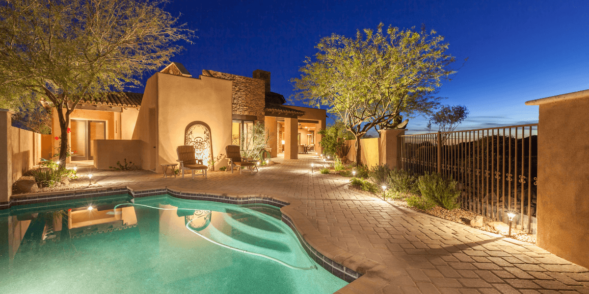 Backyard of southwestern home during summer night