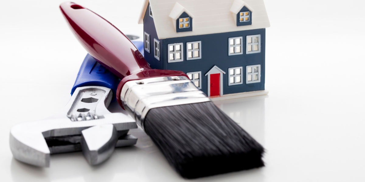 paintbrush, wrench and miniature house | Property Maintenance