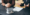 Man sitting with women discussing contract signing a lease | Rental Value